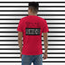 Red Short Sleeve T-Shirt. The word "TOOL" written across shoulders with the "O's" replaced with outline of peaches. The word sits on top of a black box with the word "SHED" done in a white outline written in the box.