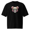 Minimalist sugar skull bear face design with bold colors on oversized black heritage streetwear t-shirt